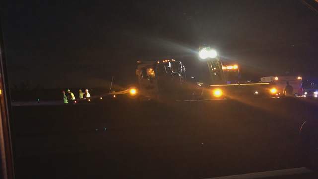 Tow truck almost falls from raised portion of I-595 after crash