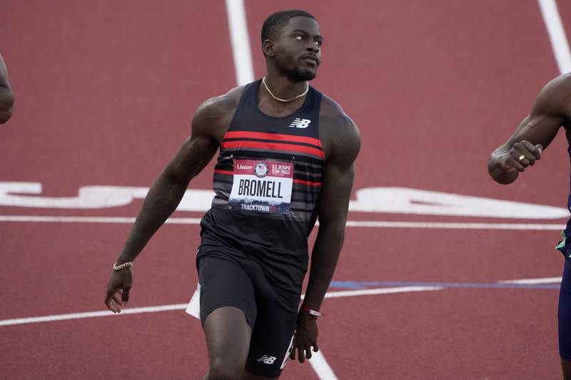The Latest: Bromell wins 100 meters for spot at Tokyo Games
