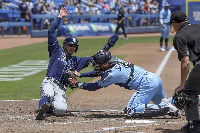 Rays rally with 5 walks in 9th, top Jays for 10th win in row