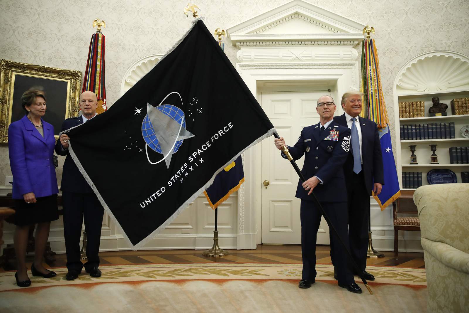 Space Force unveils flag; Trump touts 'super-duper missile'