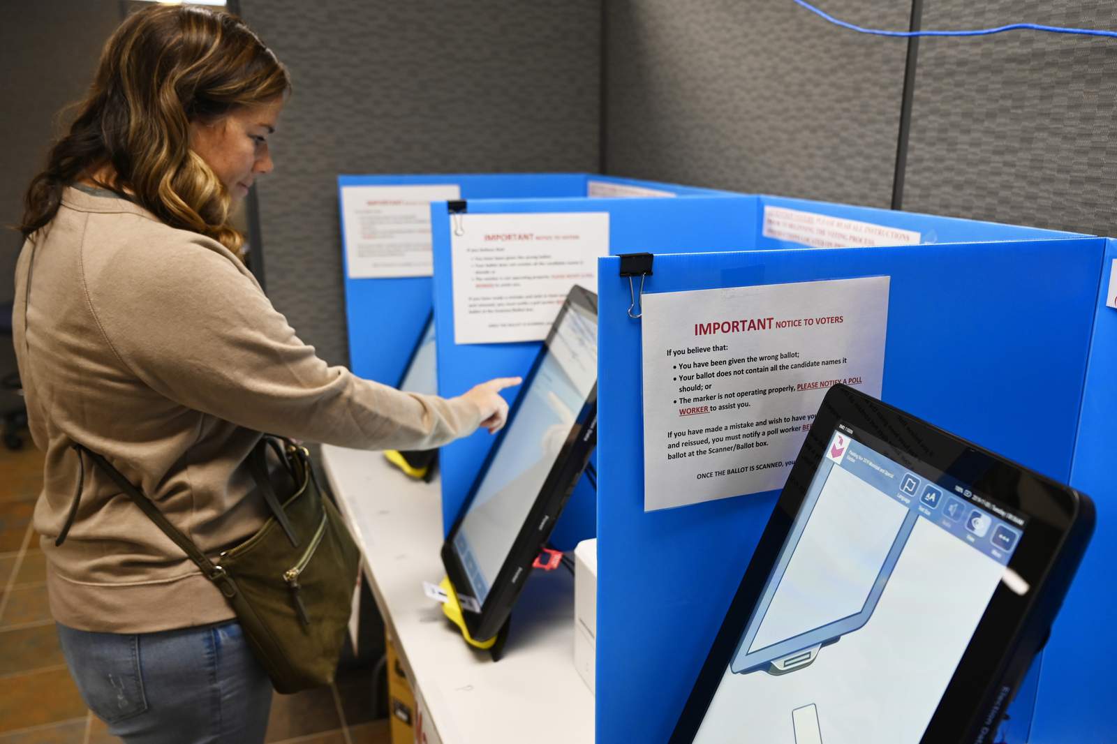 Images of 9/11 attack, porn interrupt voting machine hearing